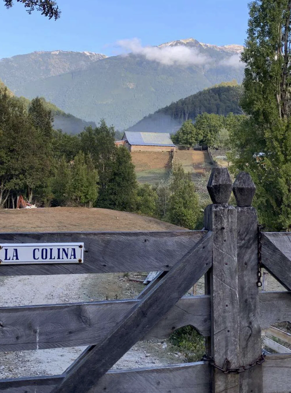 La Colina entrance gate and mountains in the Puelo Valley
